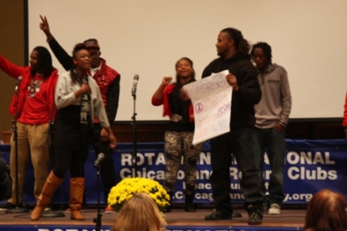 Spoken Word is a group of young artists that work with youth to share their thoughts and feelings through music and rhyme - they are at all of our Peace Summits and parades.