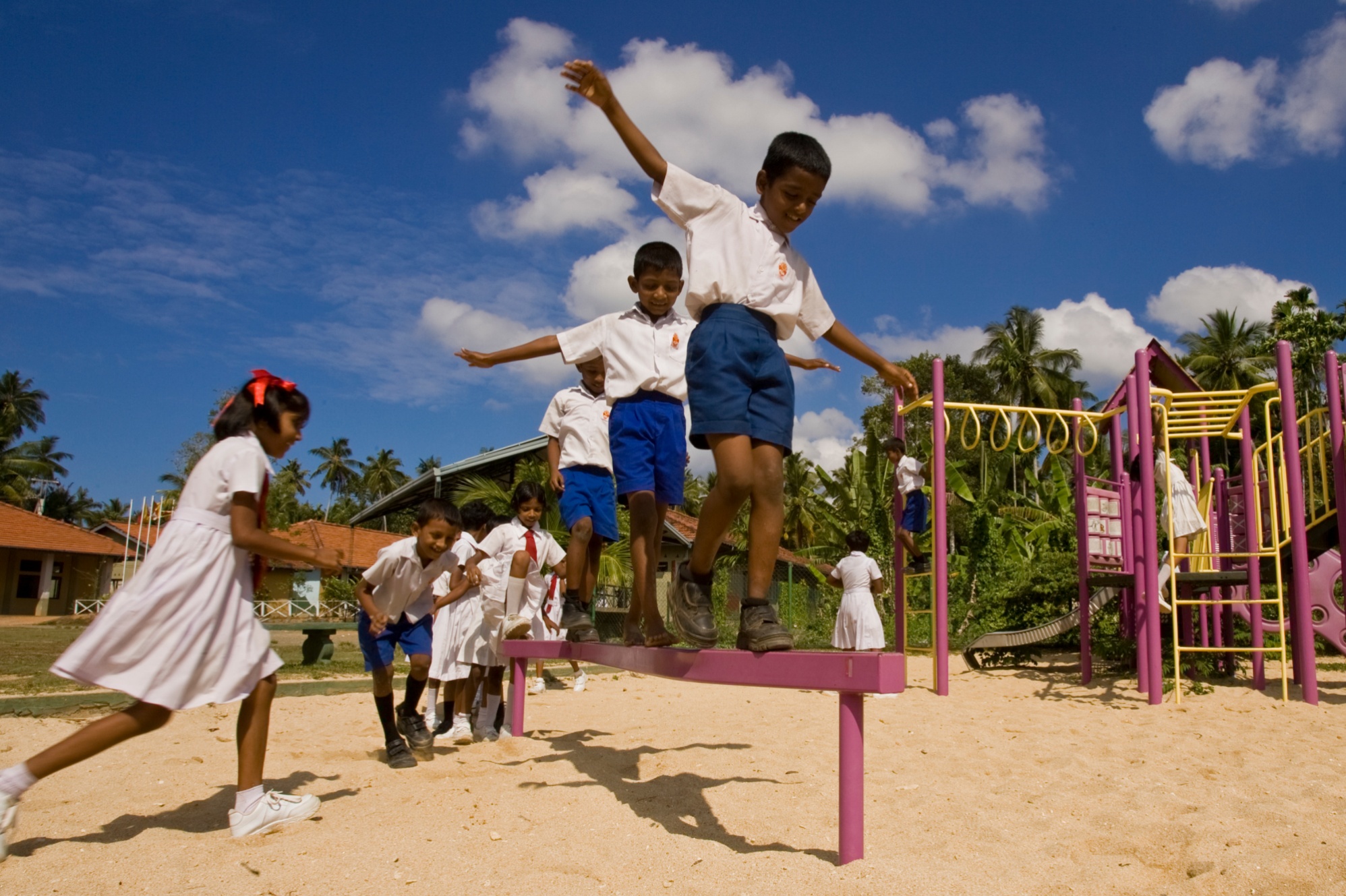 Students on the playground at Dharmarama Kanishta Vidyalaya in Ahangama, Sri Lanka. This school was rebuilt through the Schools Reawaken project after the 2004 tsunami. District 3220 (Sri Lanka) raised funds for the project and received support from The Rotary Foundation, Standard Chartered Bank, and other contributors. A local Buddhist temple donated the land.